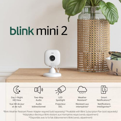 Blink Mini 2 — Plug-in smart security camera, HD night view in color, built-in spotlight, two-way audio, motion detection, Works with Alexa (White)