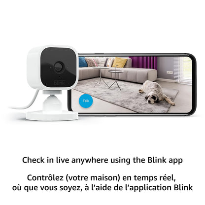 Blink Mini – Compact indoor plug-in smart security camera, 1080p HD video, night vision, motion detection, two-way audio, easy set up, Works with Alexa – 1 camera (White)